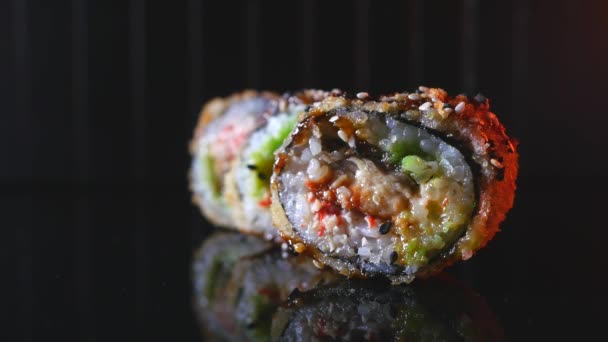 Closeup of delicious tempura rolls with eel taking with chopsticks — Stock Footage Closeup of delicious tempura rolls with eel taking with chopsticks Stock Footage