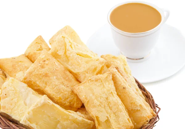 Indian Tea Time Breakfast Khari Also Know as Kharee, Khari Biscuit or Salty Puff Pastry Snacks, Served with Indian Hot Masala Chai or Hot Tea Isolated on White Background