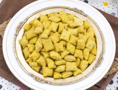 Bir gevrek tuzlu Aperatif Hindistan ve Pakistan Hindistan çay zaman baharatlı Methi Para aperatif de biliyorum olarak Namak Para veya Namkeen olduğunu.