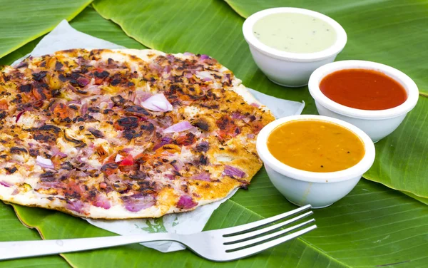 South Indian Food Uttapam Also Know As ooththappam, Rava Uttapam, Uttapa or Uthappa is a Popular South Indian Delicious Spicy Breakfast Snack Served with Coconut Chutney, Tomato Sauce and Sambar