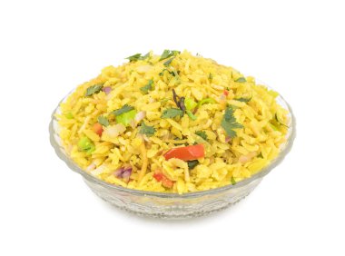 Hint kahvaltı yemek Poha de biliyorum Pohe veya Aalu poha dayak pirinç veya pirinç basık yapılmış olarak. Pirinç gevreği hafifçe hardal, soğuk, soğan, köri yaprakları ve zerdeçal yağda kızarmış