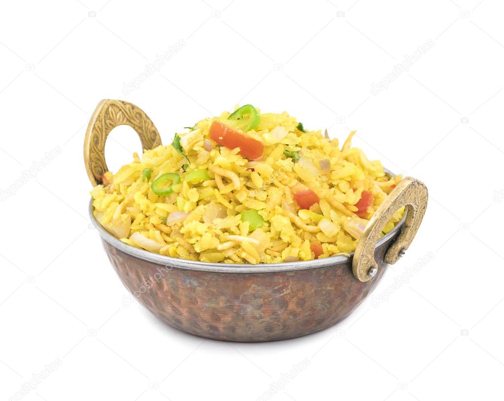 Indian Breakfast Dish Poha Also Know as Pohe or Aalu poha made up of Beaten Rice or Flattened Rice. The rice flakes are lightly fried in oil with mustard, chilly, onion, curry leaves and turmeric