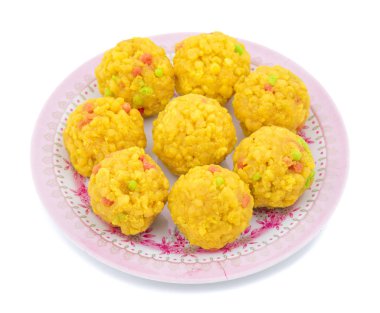 Laddu Ayrıca laddo olan tatlılar Hint Festivaller popüler top şeklinde laddoo gidecektir, biliyorum. Laddu un, kıyılmış hamur ve şeker diğer malzemelerle yapılır. Beyaz arka plan üzerinde laddu