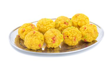 Laddu Ayrıca laddo olan tatlılar Hint Festivaller popüler top şeklinde laddoo gidecektir, biliyorum. Laddu un, kıyılmış hamur ve şeker diğer malzemelerle yapılır. Beyaz arka plan üzerinde laddu