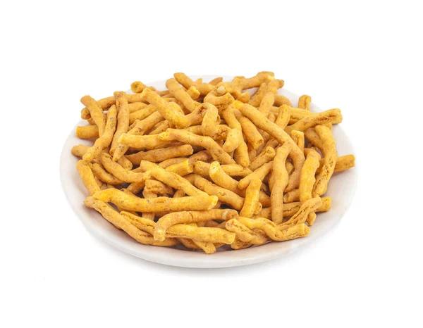 严重性是一种受欢迎的印度小吃食品 由鹰嘴豆面粉糊制成的小块脆酥面条组成 在油中油炸之前 它是用姜黄 卡宴和 Ajwain 调味的 — 图库照片