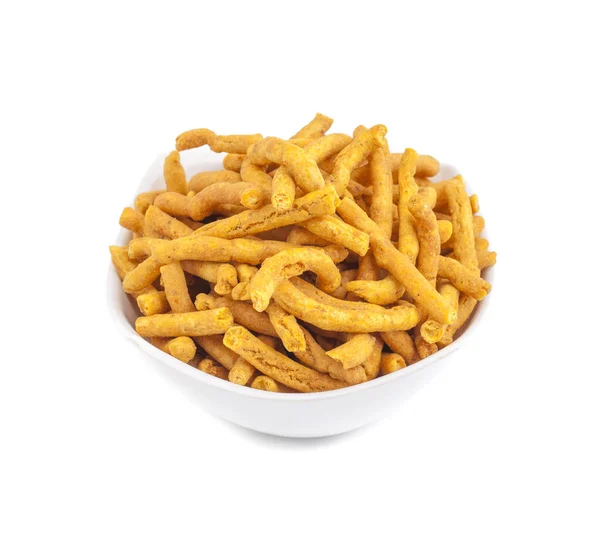 严重性是一种受欢迎的印度小吃食品 由鹰嘴豆面粉糊制成的小块脆酥面条组成 在油中油炸之前 它是用姜黄 卡宴和 Ajwain 调味的 — 图库照片