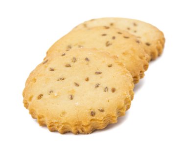 Hindistan 'da tuzlu kimyon kurabiyeleri ya da Jeera kurabiyeleri dediğimiz şey çay saati için idealdir. Küçük tatlı ve küçük tuzlu beyaz arka planda izole