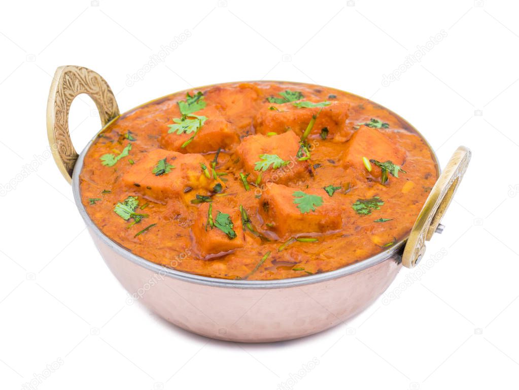 Indian Delicious Cuisine Paneer Tikka Masala Also Called Paneer Butter Masala is an Indian Dish of Marinated Paneer Cheese Served in a Spiced Gravy isolated on White Background