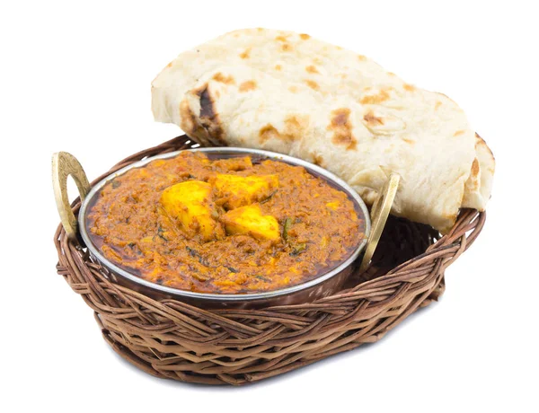 Indian Cuisine Kadai Paneer Served With Tandoori Also Know as Kadhai Paneer or Karahi Paneer is an Indian Dish of Marinated Paneer Cheese Served in a Spiced Gravy isolated on White Background