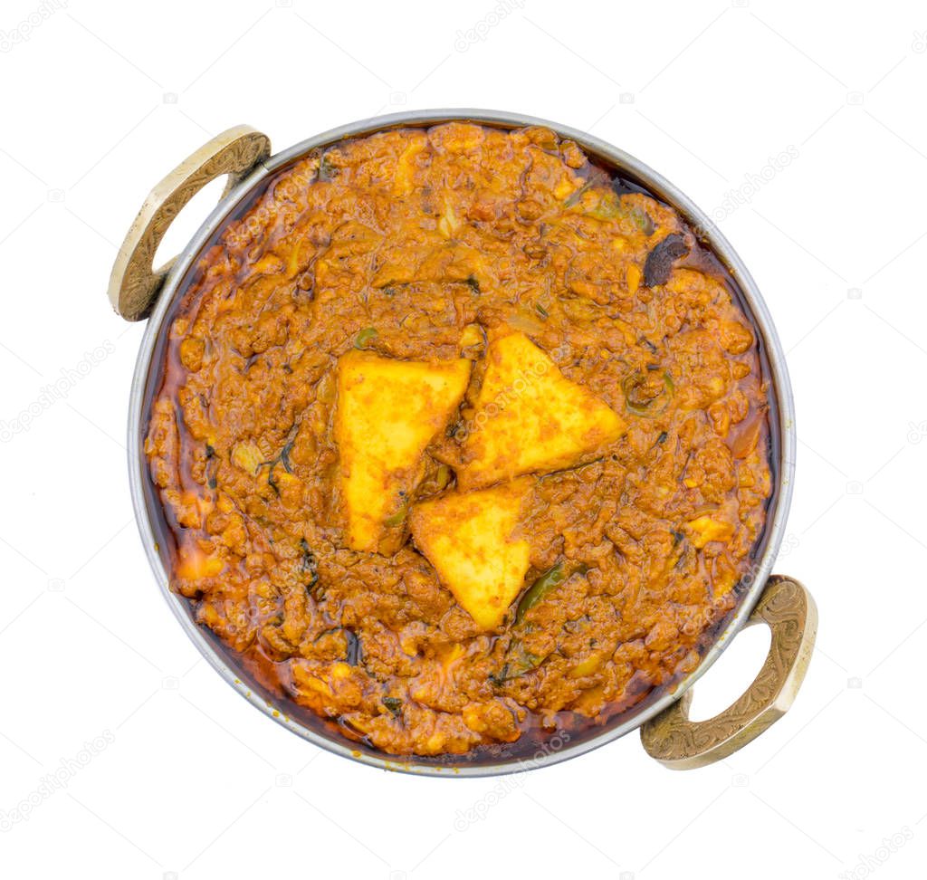 Indian Vegetarian Cuisine Kadai Paneer Also Know as Kadhai Paneer or Karahi Paneer is an Indian Dish of Marinated Paneer Cheese Served in a Spiced Gravy isolated on White Background