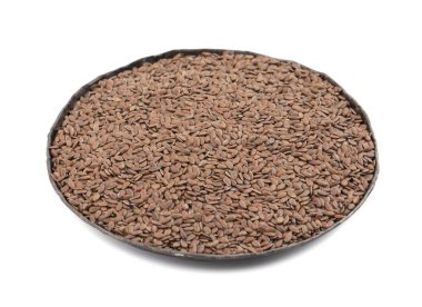 Organik Flax Tohumları Alsi, Linum usitatissimum veya beyaz arkaplanda izole edilmiş keten tohumu olarak da bilinir.