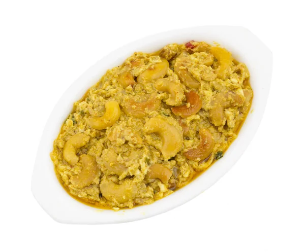 Hint geleneksel vejetaryen mutfağı Kaju köri de denilen Kaju tereyağı beyaz arka plan üzerinde izole Masala