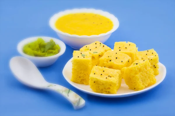 Indian Traditional Street Food Khaman Dhokla Served With Chutney & Chilli