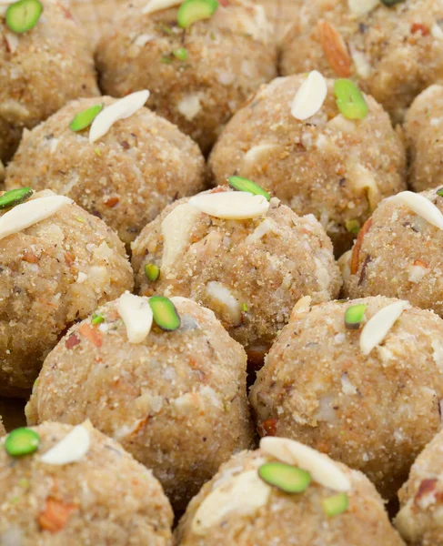 Indian Traditional Sweet Food Urad Dal Laddu Also Know as Laddoo, Ladoo, Laddo are Ball-Shaped Sweets Made of Butter, Dry Fruits, Fenugreek and other Spices. Urad Dal laddu Sweet Mostly Eat in Winter