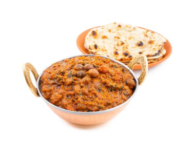 Hint Sağlıklı Mutfağı Chana Masala. Baharatlı Nohut, Channay, Chole Masala veya Chholay olarak da bilinir. Baharatlı Soğan Domates Masala Sosu 'nda Nohut Pişirerek Pişirilen Lezzetli ve Lezzetli Köri.