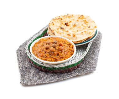 Hint Sağlıklı Mutfağı Chana Masala. Baharatlı Nohut, Channay, Chole Masala veya Chholay olarak da bilinir. Baharatlı Soğan Domates Masala Sosu 'nda Nohut Pişirerek Pişirilen Lezzetli ve Lezzetli Köri.