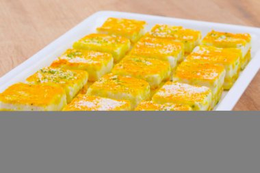 Paneer Burfi ya da Paneer Kesar Burfi (İngilizce: Paneer Burfi, İngilizce: Paneer Burfi, İngilizce: Paneer Burfi, İngilizce: Paneer Burfi, İngilizce: Paneer Burfi, İngilizce: Paneer Burfi, İngilizce: Paneer Burfi veya Paneer Kesar Burfi)