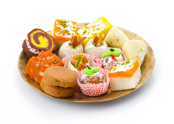 Indian Traditional Mix Sweet Food or Mix Mithai include Peda, Mawa Burfi, Dry Fruits Sweet, Halwa or Coconut Burfi