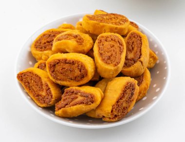 Hint Geleneksel Baharatlı Atıştırmalık Bhakarwadi Bakarwadi, Bakarvadi, Bakar Vadi veya Bakar Wadi olarak da bilinir.