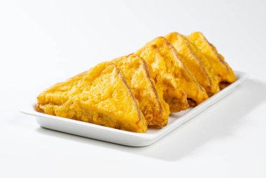 Hint usulü Kızarmış Ekmek Pakora ya da Bread Bhaji a Common Street Food, Ekmek Dilimleri, Gram unu ve Baharatlardan yapılır.