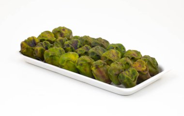 Taze Organik Çiğ Su Kestanesi 'ne yakın Hingora, Hingoda, Singhara ya da Water Caltrop olarak da bilinir.