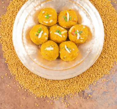 Indian Traditional Winter Sweet Food Methi Laddu Also Know as Methi Ke Laddu or Fenugreek Laddu Made From Fenugreek Seeds, Ginger, Saunf And Jaggery clipart