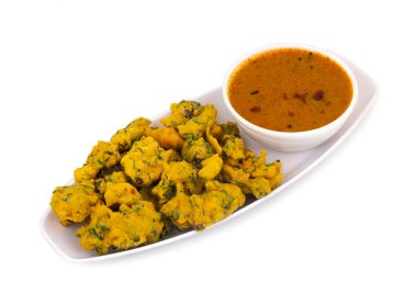 Pakora, Pakoda, Bhajiya, Rava Bhaji, Kanda Bhaji, Pyaz Pakoda, Fried Chillies, Fried Onion Pakora olarak da bilinir.