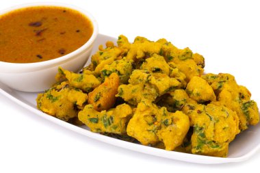 Pakora, Pakoda, Bhajiya, Rava Bhaji, Kanda Bhaji, Pyaz Pakoda, Fried Chillies, Fried Onion Pakora olarak da bilinir.