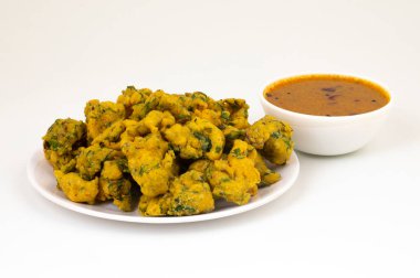 Pakora, Pakoda, Bhajiya, Rava Bhaji, Kanda Bhaji, Pyaz Pakoda, Fried Chillies, Fried Onion Pakora olarak da bilinir.