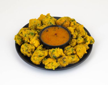 Pakora, Pakoda, Bhajiya, Rava Bhaji, Kanda Bhaji, Pyaz Pakoda, Fried Chillies, Fried Onion Pakora olarak da bilinir.