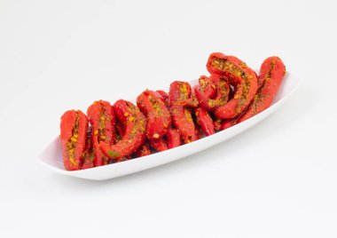 Hint ev yapımı kırmızı biber turşusu Mirchi Ka Achar, Loncha veya Laal Mirch Ka Achar olarak da bilinir.