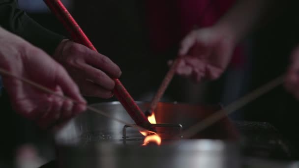 Unidentified Person Burning Incense Sticks Slow Motion — Stock Video