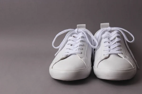 men's gym shoes on a colored background. Men's footwear. minimalism.