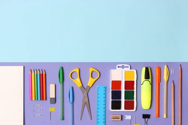 set of stationery on a colored background with space for text. back to school. office tools. flat lay, top view
