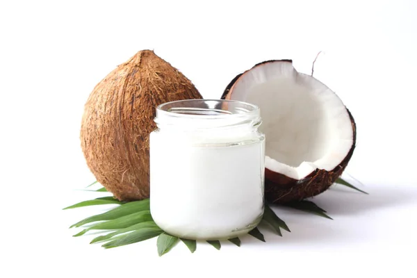 Kokosové Ořechy Kokosový Olej Tropickými Listy Dřevěném Pozadí — Stock fotografie