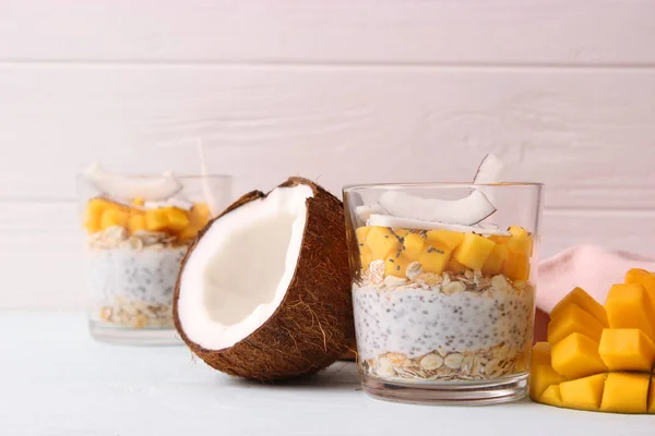 chia pudding with mango, coconut and granola. Proper nutrition, superfood. Healthy breakfast, dessert.