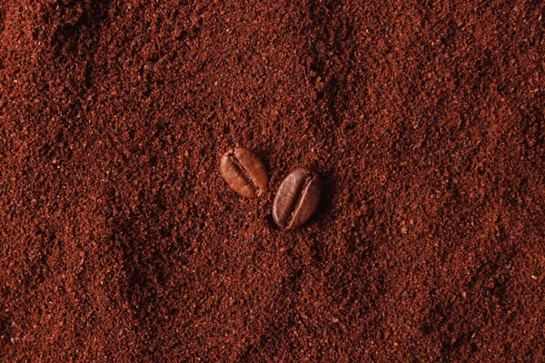 coffee beans and ground coffee closeup, aromatic coffee, coffee drinks