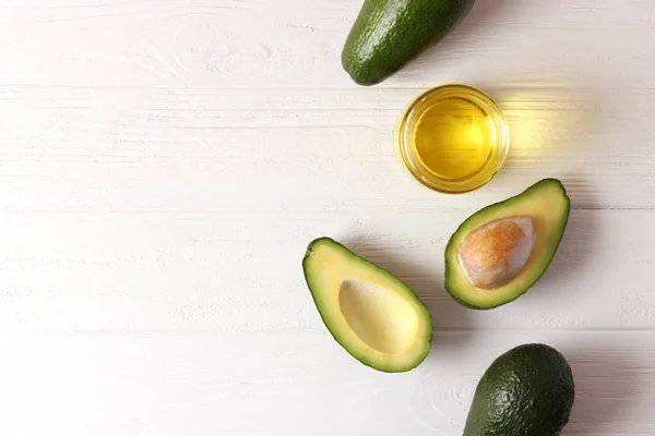 Aceite Aguacate Frutas Aguacate Una Mesa Madera — Foto de Stock