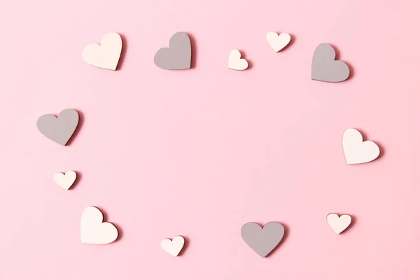 Valentine\'s day background in minimalism style. Hearts, background, place to insert text.