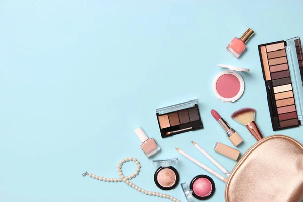 professional makeup tools. Makeup products on a colored background top view. A set of various products for makeup.