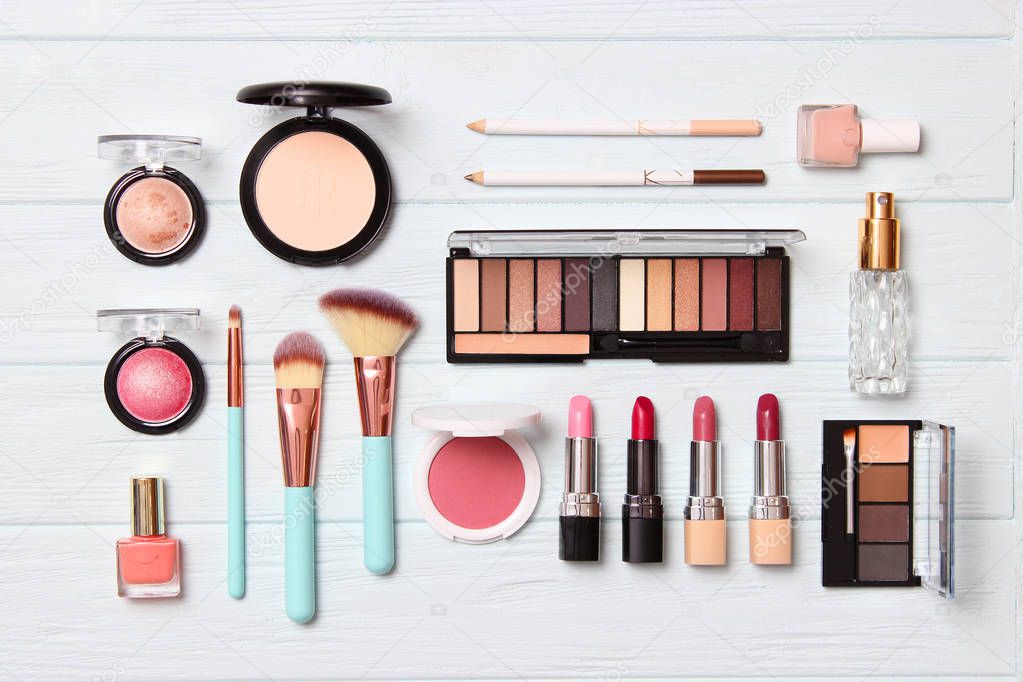 professional makeup tools. Makeup products on a colored background top view. A set of various products for makeup.