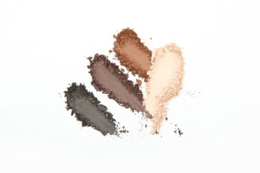 Beyaz arka planda göz farı. Gözlerinden kokular geliyor. Güzel göz farı. Minimalizm. Göz gölgelerinin moda renkleri.