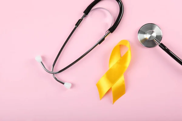 Yellow Ribbon Symbolizing Cancer Children Top View — Stock Photo, Image