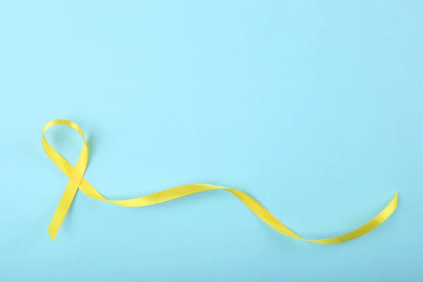 Žlutá Stuha Symbolizující Rakovinu Dětí Horní Pohled — Stock fotografie