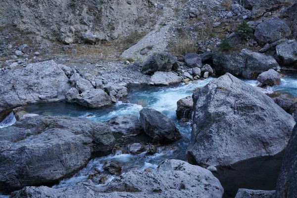 View of the mountain Guloyhi river among the stones in the Guloyhi gorge in the Alpine Dzheyra-Assinsky natural museum reserve, Ingushetia, North Caucasus