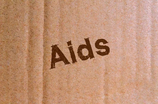 Aids Cartone Cartone Con Lettere Marroni — Foto Stock