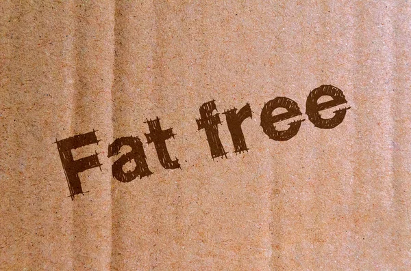 fat free - carton, cardboard with brown letters