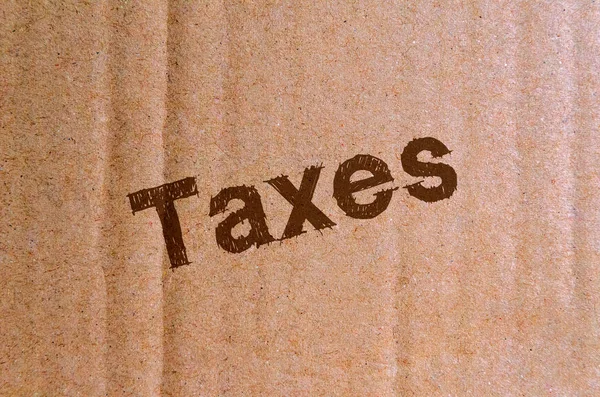 Taxes Carton Carton Avec Lettres Brunes — Photo