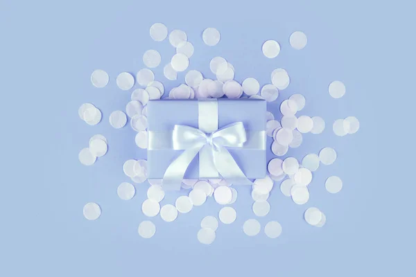 Present Box Bow Blue Background Multicolored Confetti Flat Lay Style — Stock Photo, Image