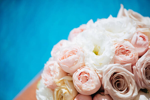 flowers and water pool around blue water. Summer party concept